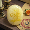 Zibu Symbol Palm Stone – Awakening Symbol Engraved on Citrine