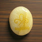 Zibu Symbol Palm Stone – Awakening Symbol Engraved on Citrine