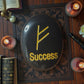 Zibu Symbol Palm Stone – Success Symbol Engraved on Black Tourmaline